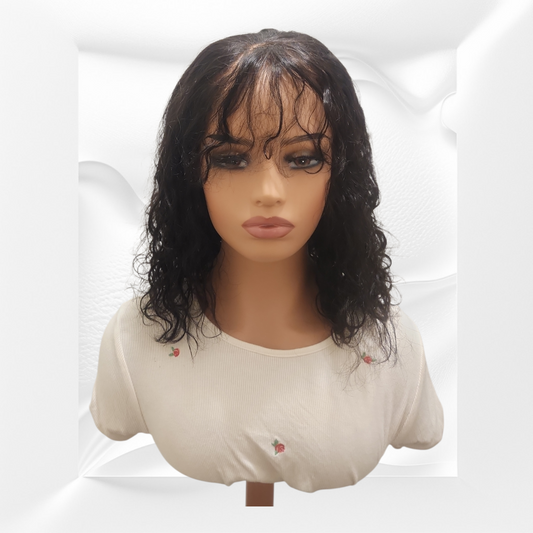 Mannequin head with a black wig on a white background