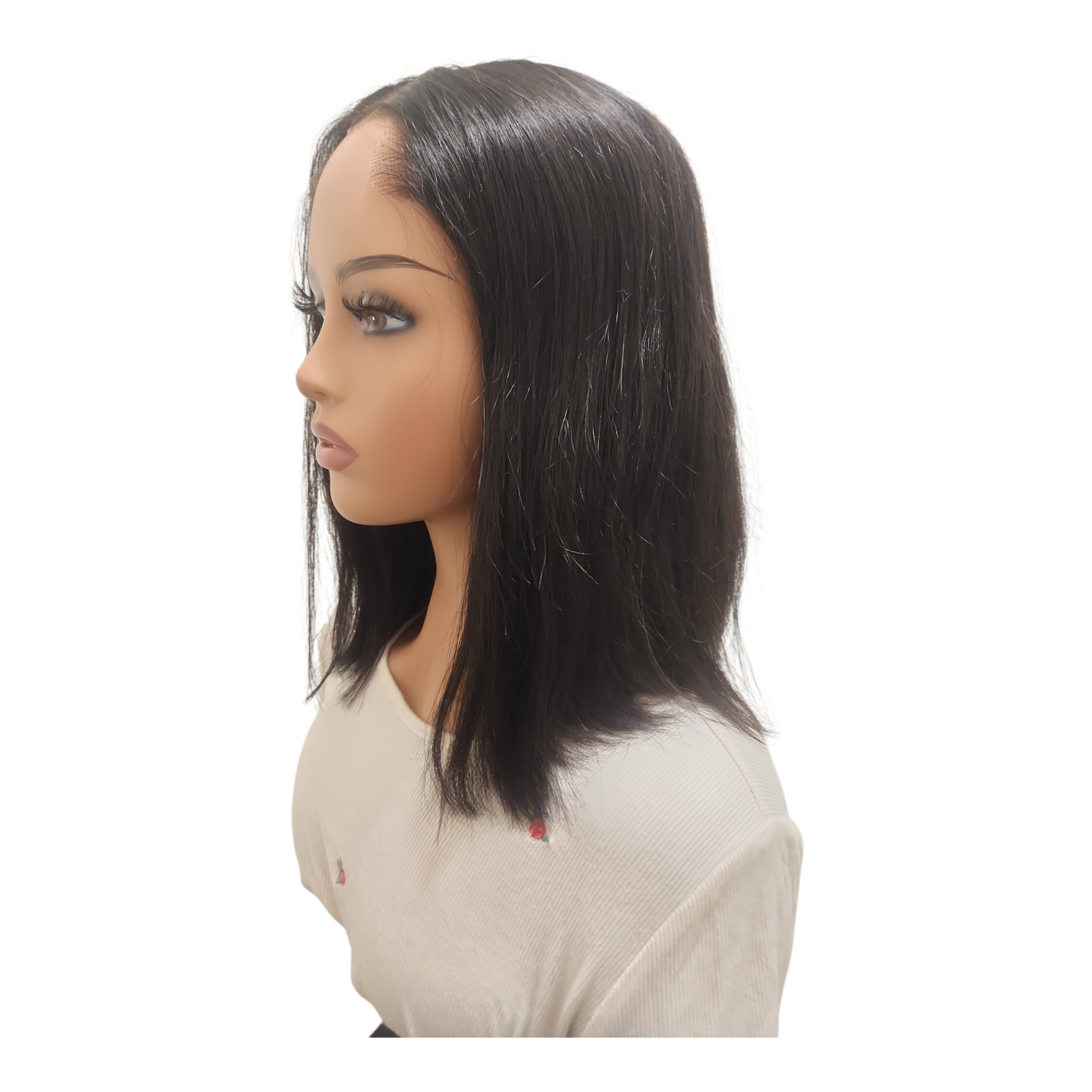 Mannequin head with a black wig on a white background