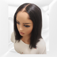 Mannequin head with a black wig on a white background