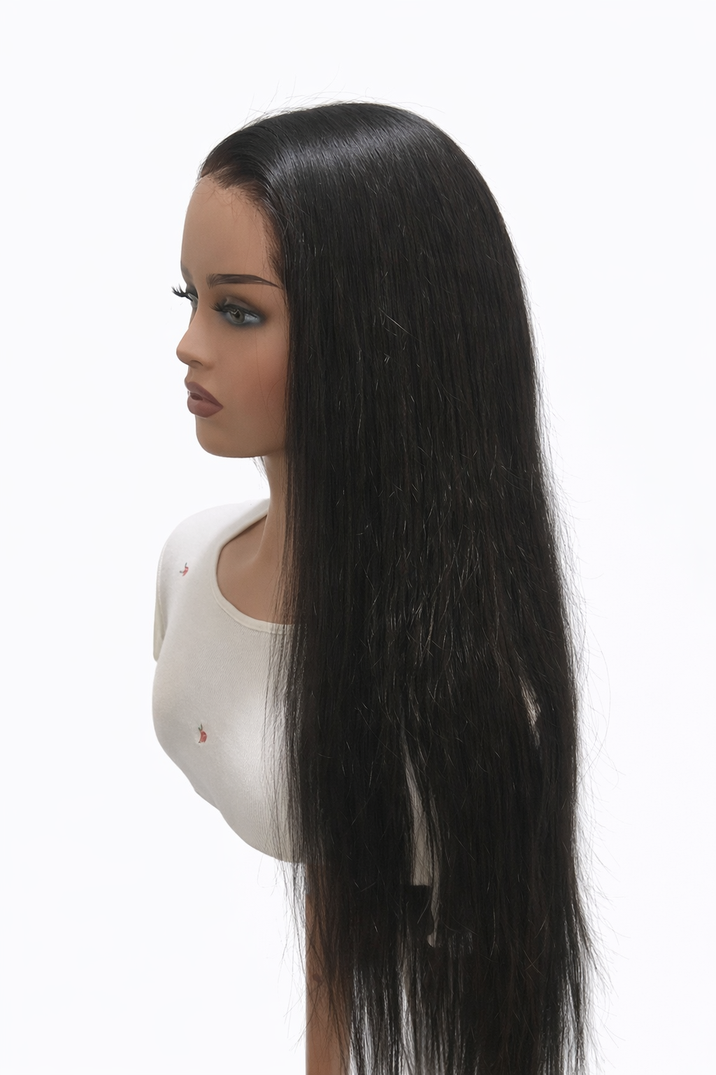 Mannequin head with long black hair on a white background